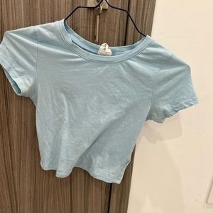 Blue slightly cropped shirt from Tilly’s